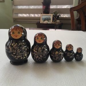Five piece nesting doll set marked 5M